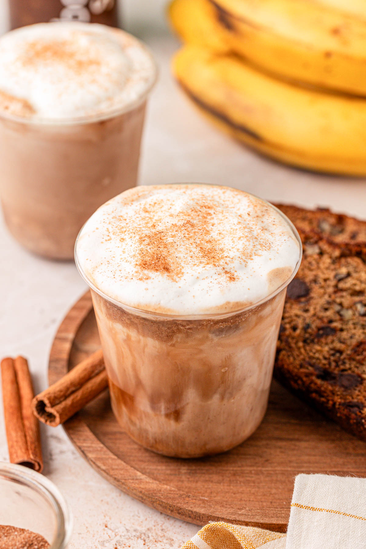 Banana bread lattes on a table.