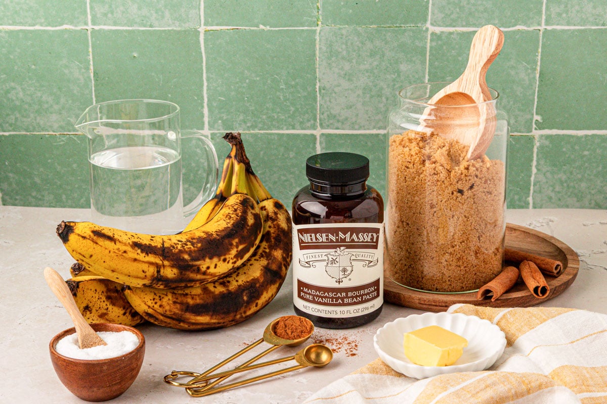 Ingredients to make banana syrup on a counter.