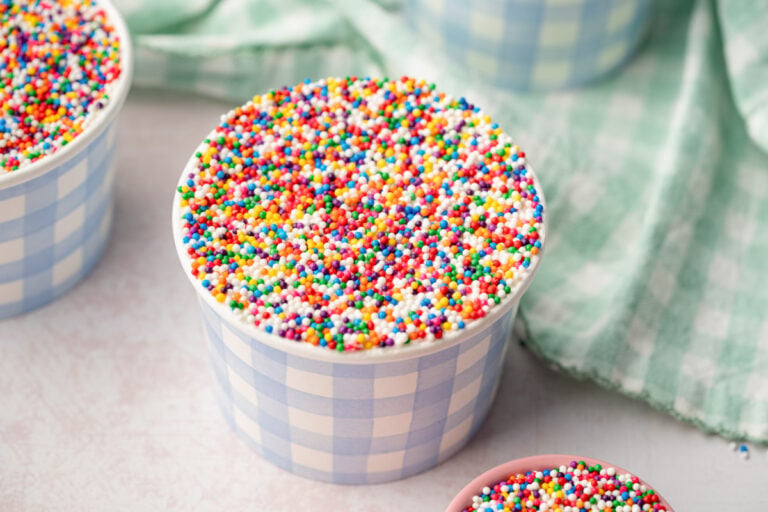 Close up of dot cakes on a white table.