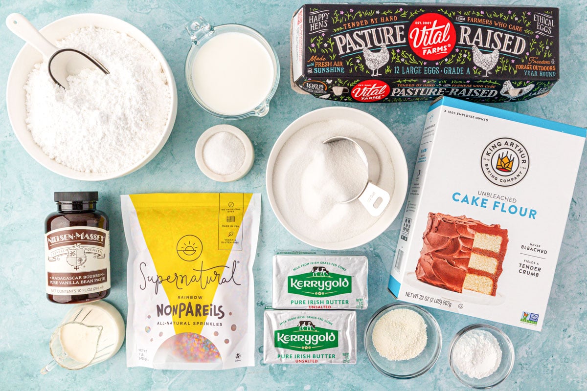 Ingredients to make the viral dot cakes on a blue table.