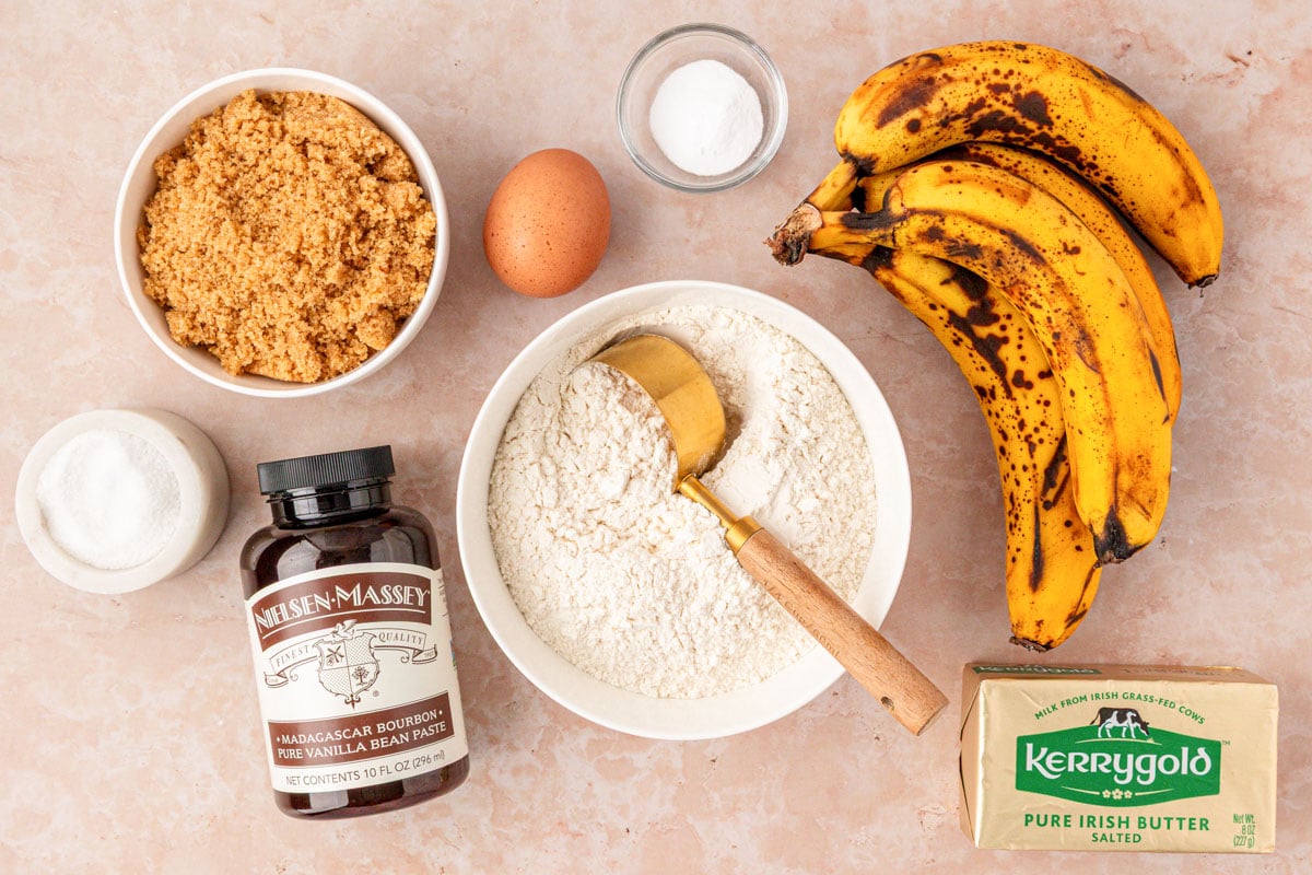Ingredients to make banana bread with browned butter on a table.