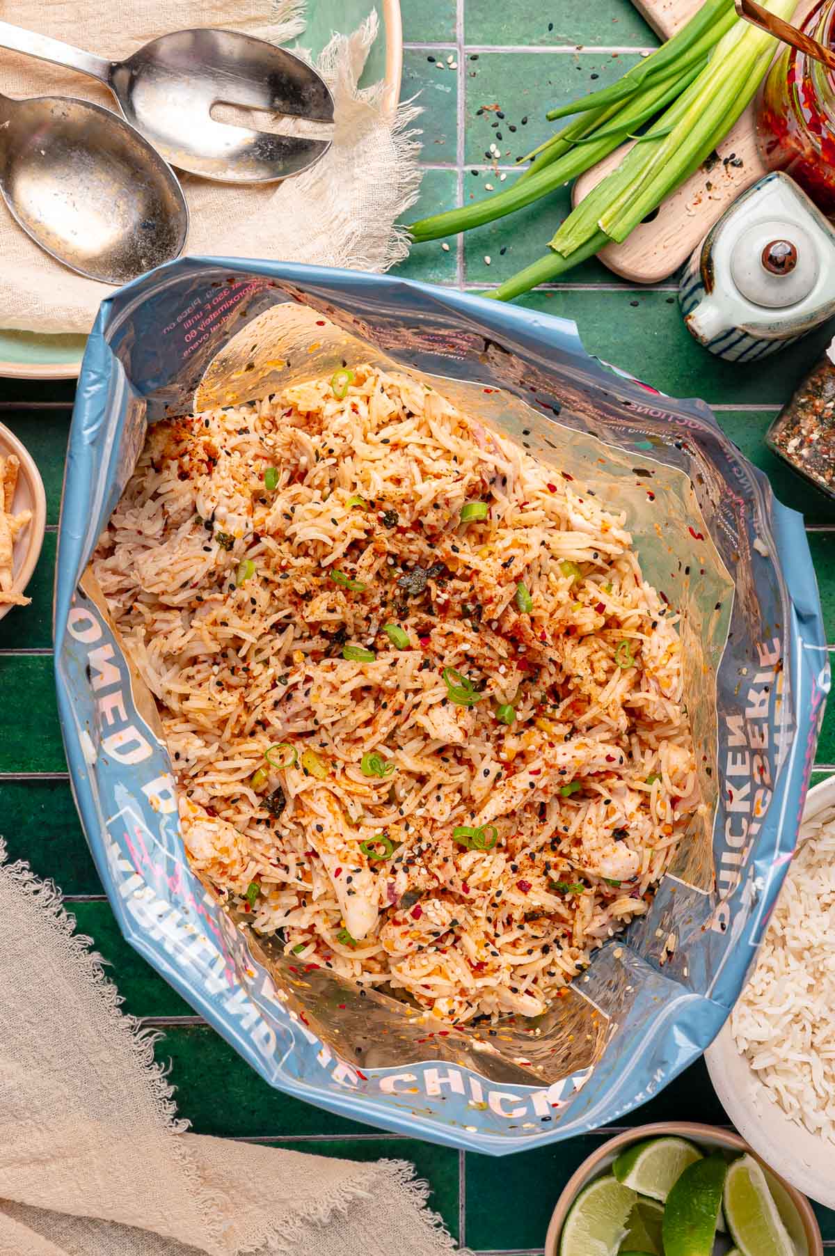 A rotisserie chicken bag filled with rice, shredded chicken, and spices.