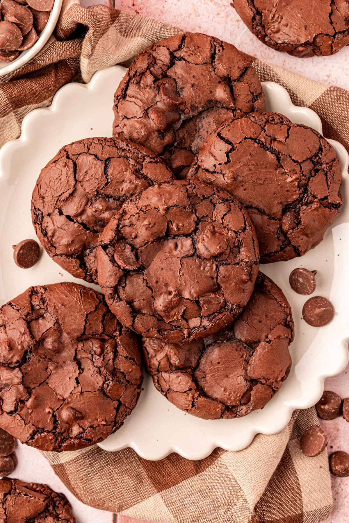Overhead photo of brownie cookies on a white plate.