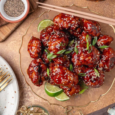 Overhead photo of a glass plate filled with Korean Fried Cauliflower.