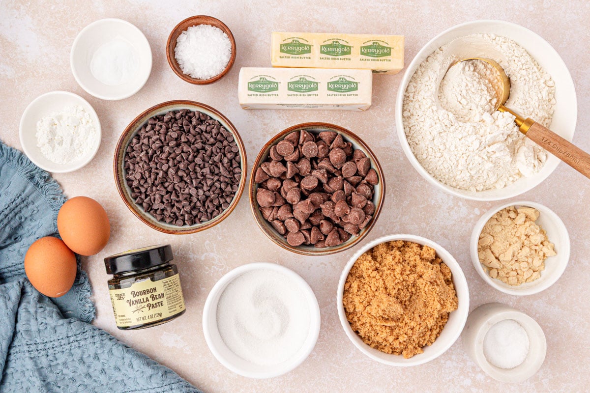 Ingredients to make scoopable chocolate chip cookies on a table.