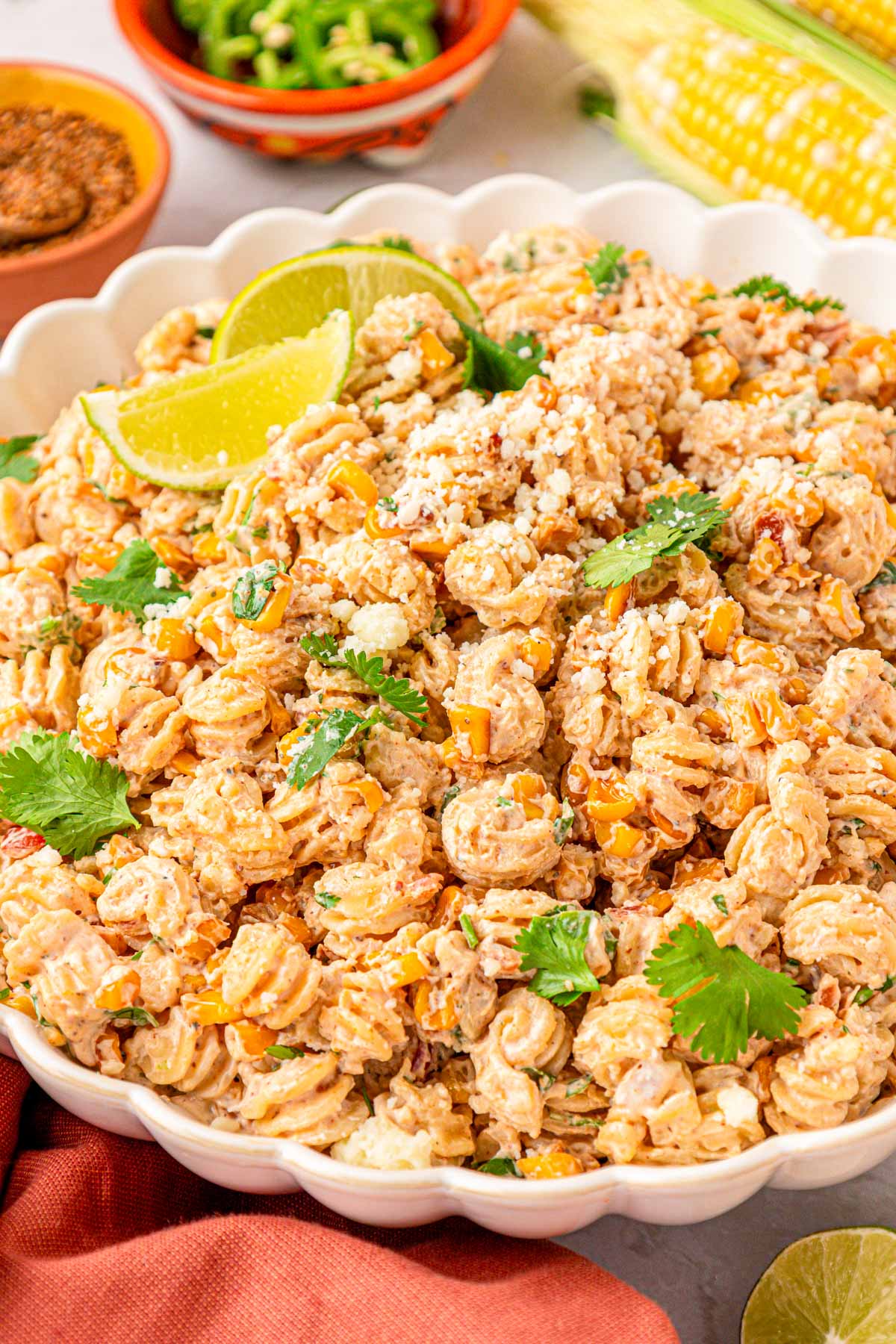 Bowl of street corn pasta salad on a table.